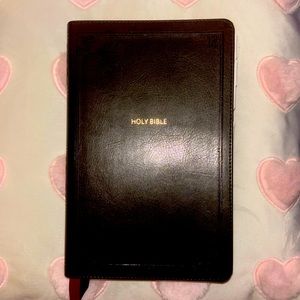 NKJV Bible with tabbed floral sticker.